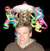 boy wearing a party hat